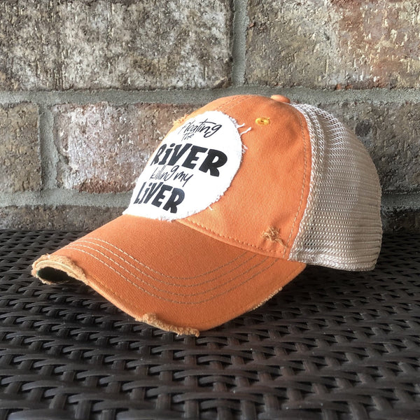 Floating the River Killing My Liver hat by BohoGroove featuring distressed off-white patch with black writing on a sherbet vintage distressed snapback right side 