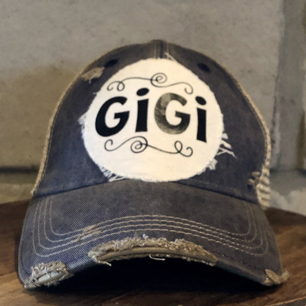 Gigi Hat by BohoGroove with black Gigi lettering on distressed off-white patch on a navy blue vintage distressed snapback