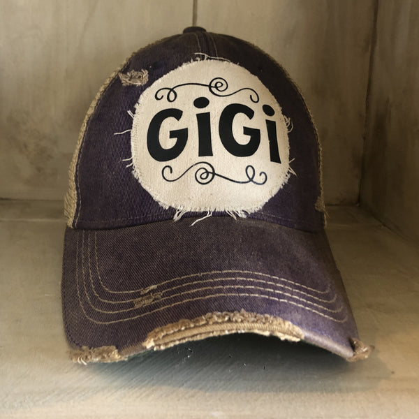 Gigi Hat by BohoGroove with black Gigi lettering on distressed off-white patch on a purple vintage distressed snapback