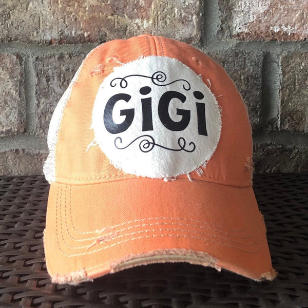 Gigi Hat by BohoGroove with black Gigi lettering on distressed off-white patch on an sherbet vintage distressed snapback