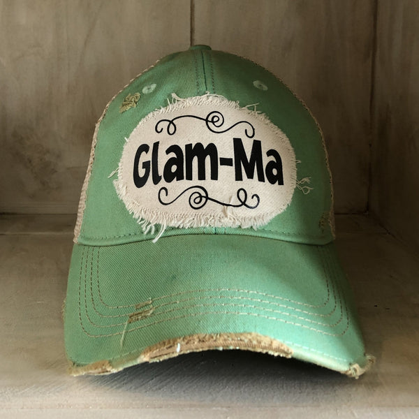 Glam-Ma hat by BohoGroove with black Glam-Ma lettering on distressed off-white patch on a mint vintage distressed snapback.