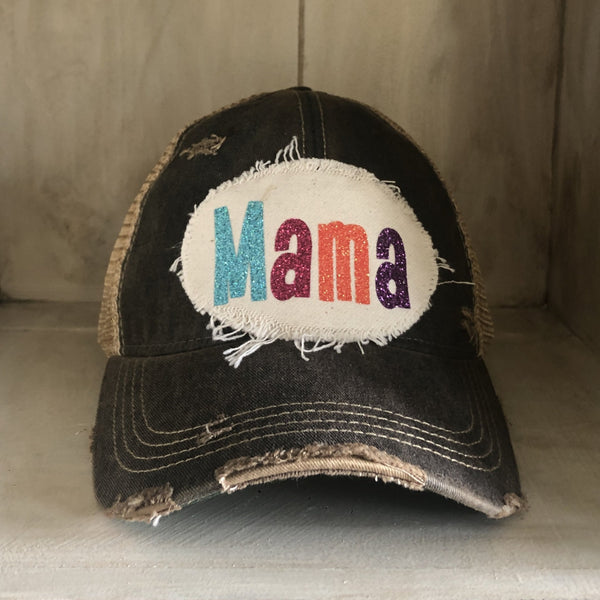 Mama Hat by BohoGroove with turquoise, pink, orange, and purple glitter Mama lettering on distressed off-white patch on a black vintage distressed snapback