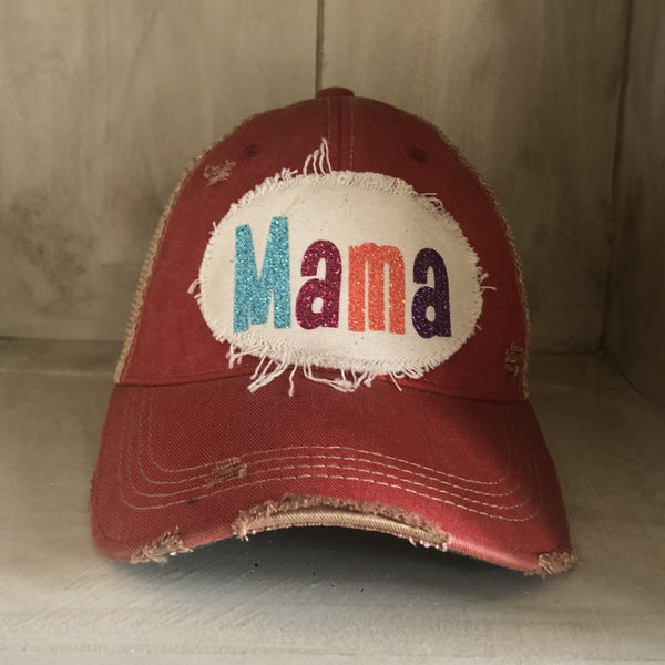 Mama Hat by BohoGroove with turquoise, pink, orange, and purple glitter Mama lettering on distressed off-white patch on a red vintage distressed snapback