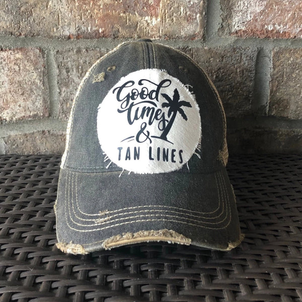 Good Times & Tan Lines hat by BohoGroove with black lettering and palm tree graphic on distressed off-white patch on black vintage distressed snapback.