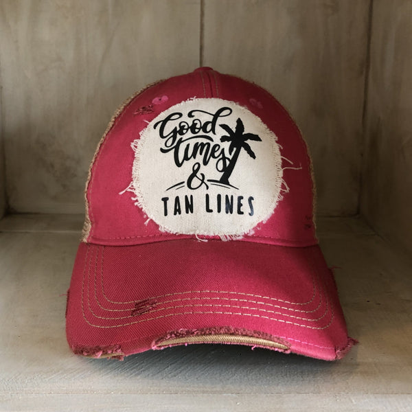 Good Times & Tan Lines hat by BohoGroove with black lettering and palm tree graphic on distressed off-white patch on pink vintage distressed snapback.