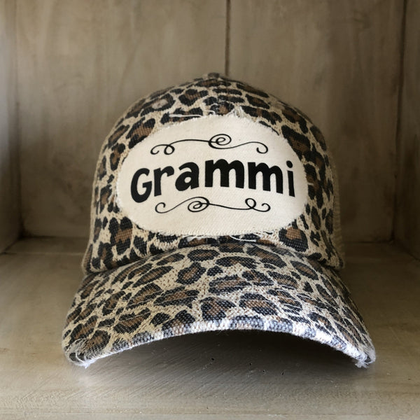 Grammi hat by BohoGroove with black Grammi lettering on a distressed off-white patch on a leopard vintage distressed snapback.