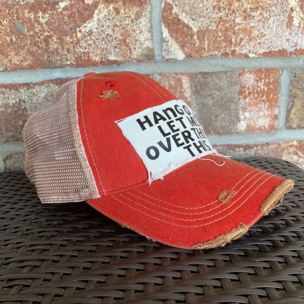 Left side view Hang On Let Me Overthink This hat by BohoGroove with black Hang On Let Me Overthink This lettering on a distressed off-white patch on a red vintage distressed snapback trucker hat.