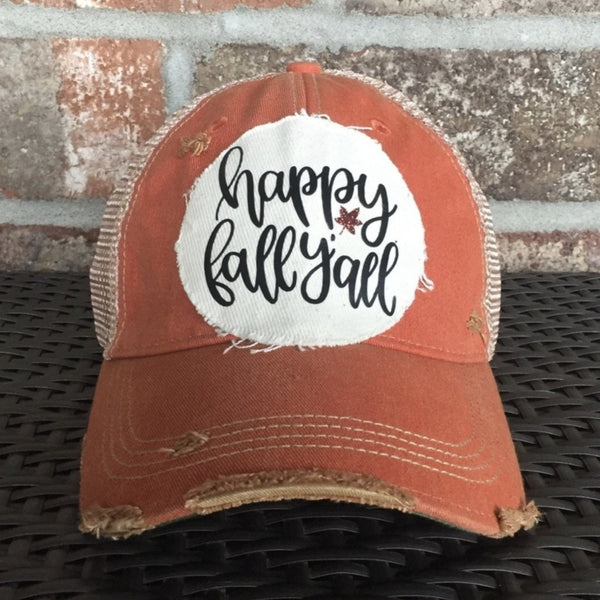 Happy Fall Y’all hat by BohoGroove featuring black script Happy Fall Y’all lettering with a glitter leaf accent on a cream patch on an orange vintage distressed snapback.