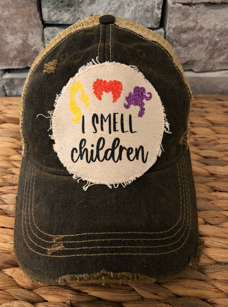 Hocus Pocus Glitter I Smell Children hat by BohoGroove with glitter witch silhouettes and I Smell Children wording on a distressed off-white patch on a black vintage distressed snapback.