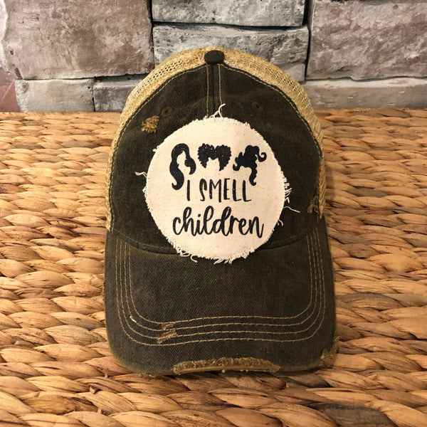 Hocus Pocus I Smell Children hat by BohoGroove with black witch silhouette graphic and I Smell Children wording on a distressed off-white patch on a black vintage distressed snapback.