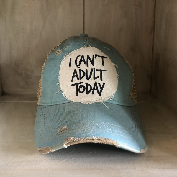 I Can't Adult Today hat by BohoGroove with black lettering on a distressed off-white patch on an ocean blue vintage distressed snapback trucker hat.
