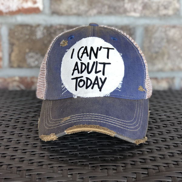 I Can't Adult Today hat by BohoGroove with black lettering on a distressed off-white patch on a royal blue vintage distressed snapback trucker hat.