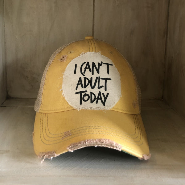 I Can't Adult Today hat by BohoGroove with black lettering on a distressed off-white patch on a yellow vintage distressed snapback trucker hat.