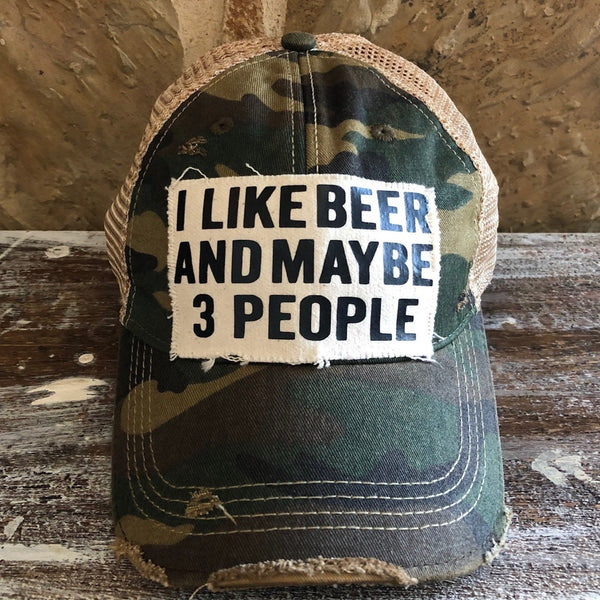 I Like Beer and Maybe 3 People hat by BohoGroove with black lettering on a distressed off-white custom patch on a camo vintage distressed snapback.