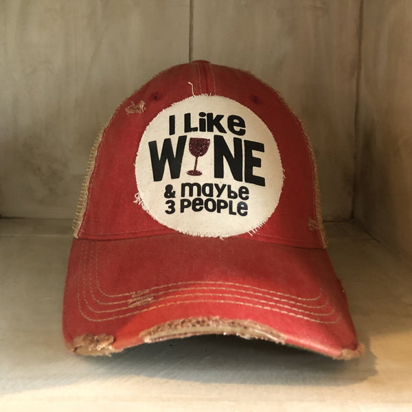 I Like Wine and Maybe 3 People hat by BohoGroove with black lettering and a glitter wine glass graphic on a distressed off-white patch on a red vintage distressed snapback.