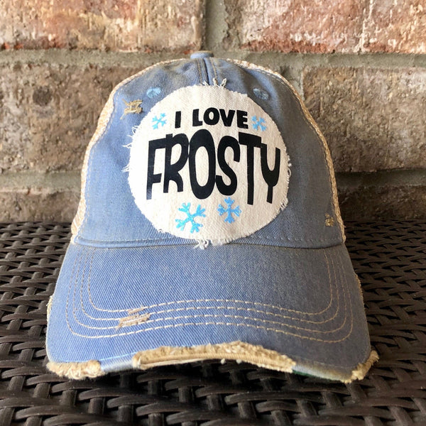 I Love Frosty hat by BohoGroove with black lettering and blue snowflake graphics on a distressed off-white custom patch on a light blue vintage distressed snapback.