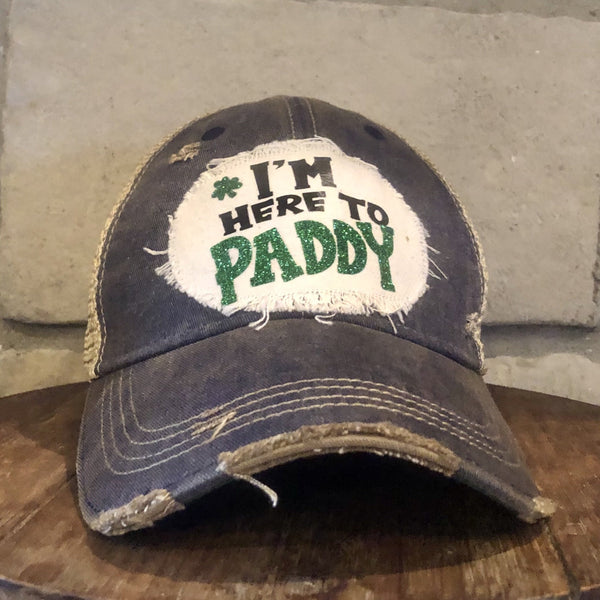 I'm Here to Paddy hat by BohoGroove with green lettering and shamrock graphic on a distressed off-white custom patch on a navy blue vintage distressed snapback.