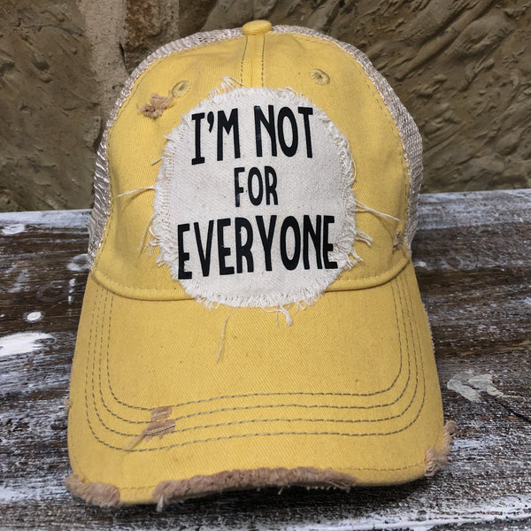 Im Not For Everyone hat by BohoGroove with black lettering on distressed off-white patch on yellow vintage distressed snapback.