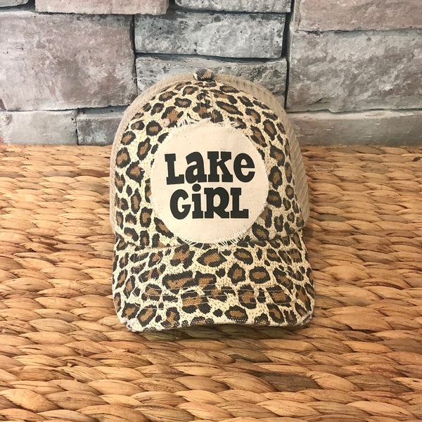 Lake Girl hat by BohoGroove with black Lake Girl lettering on distressed off-white patch on a leopard vintage distressed snapback.