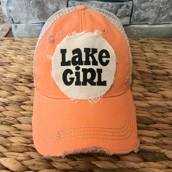 Lake Girl hat by BohoGroove with black Lake Girl lettering on distressed off-white patch on a sherbet vintage distressed snapback.