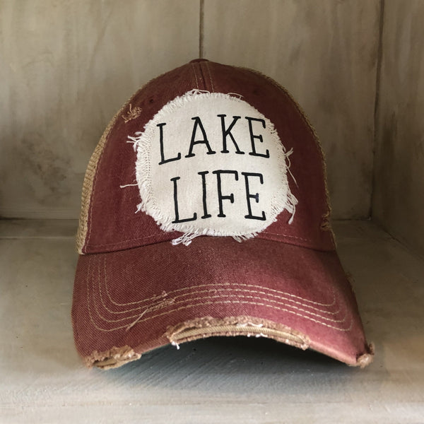 Lake Life hat by BohoGroove with black Lake Life lettering on distressed off-white patch on a brick red vintage distressed snapback.