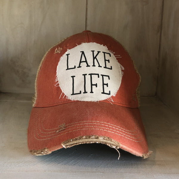 Lake Life hat by BohoGroove with black Lake Life lettering on distressed off-white patch on an orange vintage distressed snapback.