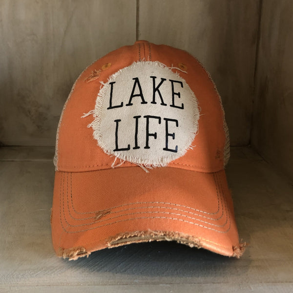 Lake Life hat by BohoGroove with black Lake Life lettering on distressed off-white patch on a sherbet vintage distressed snapback.