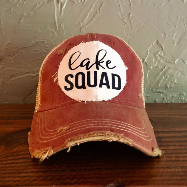 Lake Squad hat by BohoGroove with black Lake Squad lettering on distressed off-white patch on a brick red vintage distressed snapback.