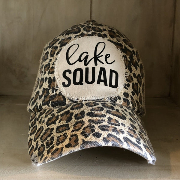 Lake Squad hat by BohoGroove with black Lake Squad lettering on distressed off-white patch on a leopard vintage distressed snapback.
