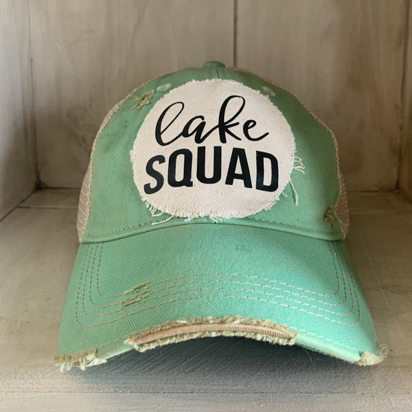 Lake Squad hat by BohoGroove with black Lake Squad lettering on distressed off-white patch on a mint green vintage distressed snapback.