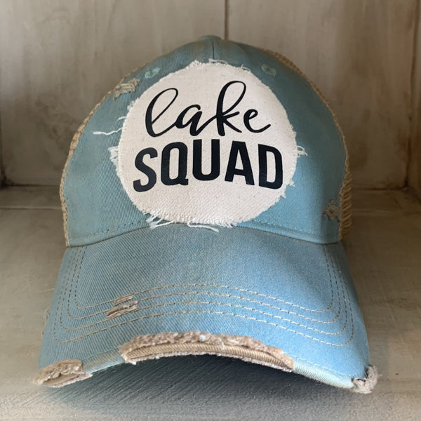 Lake Squad hat by BohoGroove with black Lake Squad lettering on distressed off-white patch on an ocean blue vintage distressed snapback.