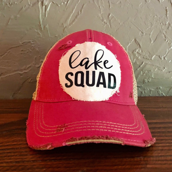 Lake Squad hat by BohoGroove with black Lake Squad lettering on distressed off-white patch on a pink vintage distressed snapback.