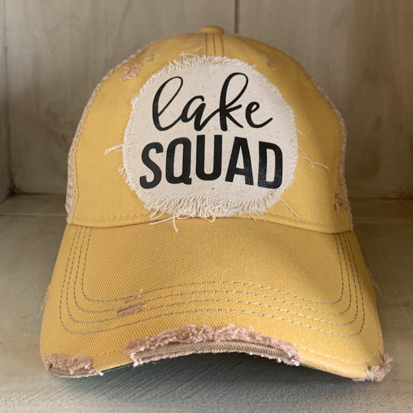 Lake Squad hat by BohoGroove with black Lake Squad lettering on distressed off-white patch on a yellow vintage distressed snapback.