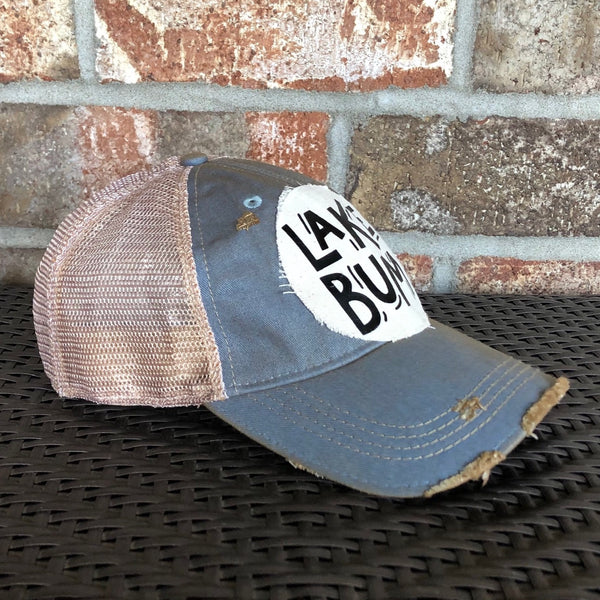 Lake Squad hat by BohoGroove with black Lake Squad lettering on distressed off-white patch on a light blue vintage distressed snapback left side.