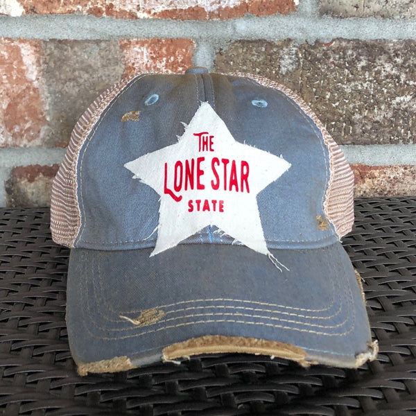 Lone Star State hat by BohoGroove with red Lone Star State lettering on white star-shaped patch and light blue vintage distressed snapback