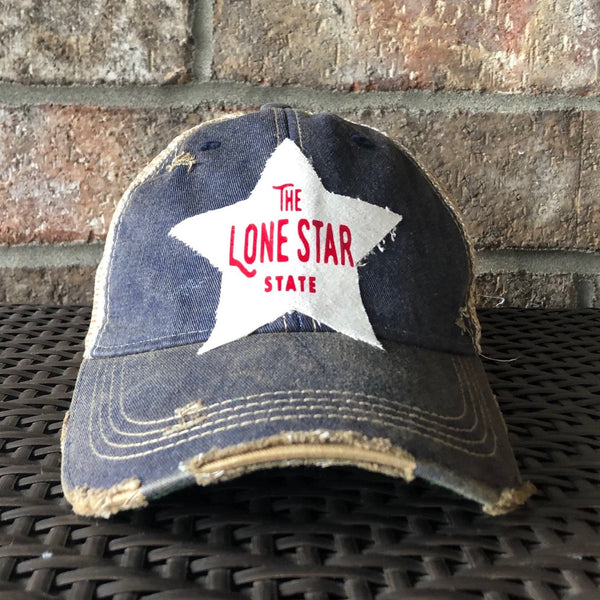 Lone Star State hat by BohoGroove with red Lone Star State lettering on white star-shaped patch and navy blue vintage distressed snapback