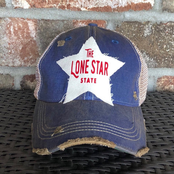 Lone Star State hat by BohoGroove with red Lone Star State lettering on white star-shaped patch and royal blue vintage distressed snapback
