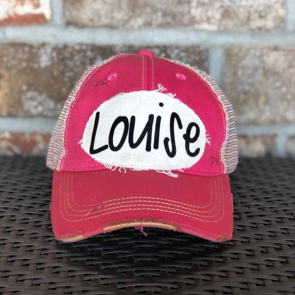 Louise hat by BohoGroove with black Louise lettering on a distressed off-white patch on a pink vintage distressed snapback.
