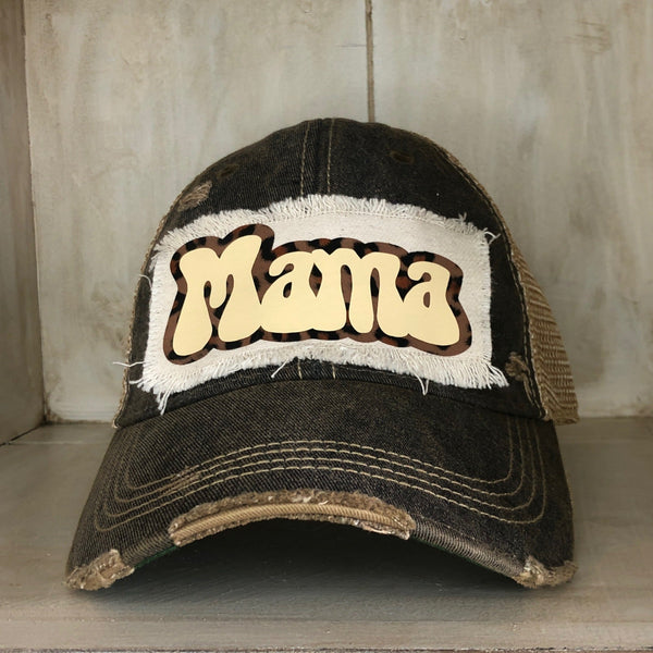 Mama hat by BohoGroove with ivory Mama lettering and leopard outline detail on a distressed off-white patch on a black vintage distressed snapback.