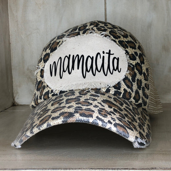 Mamacita hat by BohoGroove with black Mamacita lettering on distressed off-white patch on a leopard vintage distressed snapback.
