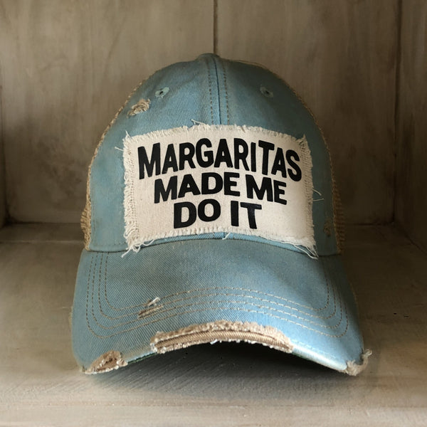 Margaritas Made Me Do It hat by BohoGroove with black lettering on a distressed off-white patch on an ocean blue vintage distressed snapback.
