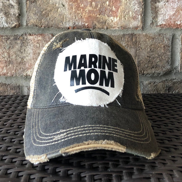Marine Mom hat by BohoGroove with black Marine Mom lettering on a distressed off-white patch on a black vintage distressed snapback.
