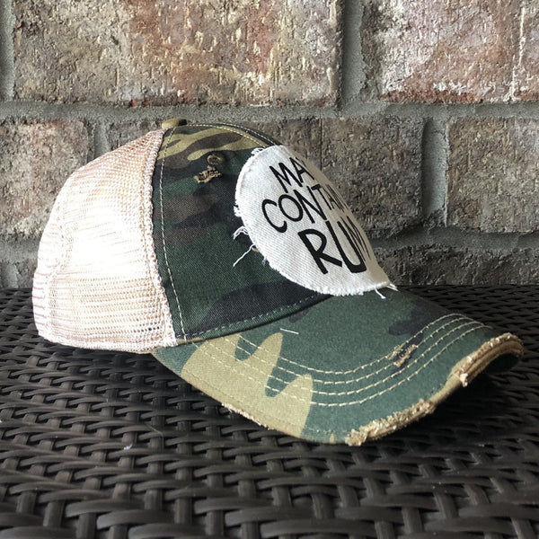 May Contain Rum hat by BohoGroove featuring distressed off-white patch with black writing on a camo vintage distressed snapback left side