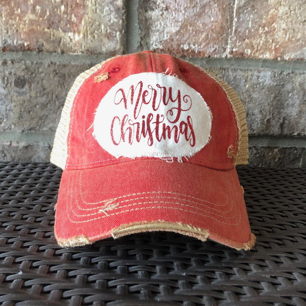 Merry Christmas Glitter hat by BohoGroove with red glitter Merry Christmas script lettering on a distressed off-white custom patch on a red vintage distressed snapback.