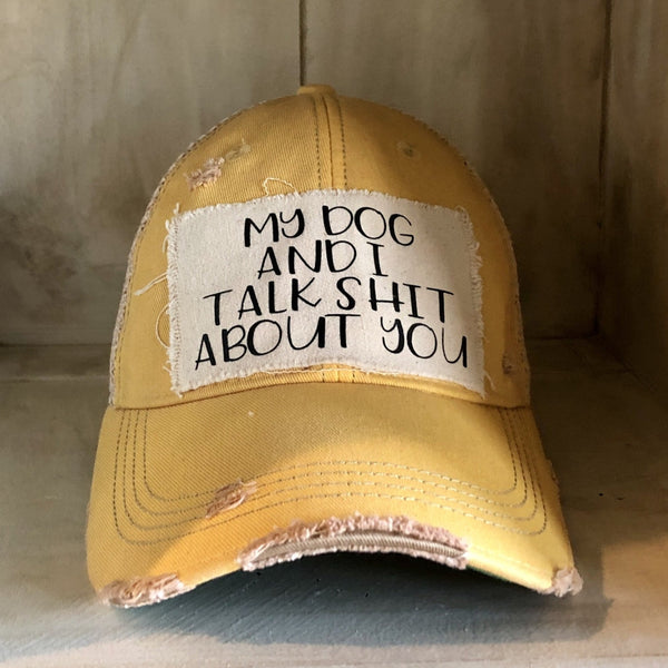 My Dog and I Talk Shit About You hat by BohoGroove with black My Dog and I Talk Shit About You lettering on a distressed off-white patch on a yellow vintage distressed snapback.