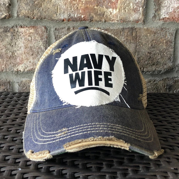Navy Wife hat by BohoGroove with black Navy Wife lettering on a distressed off-white patch on a navy blue vintage distressed snapback.