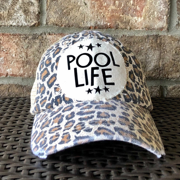 Pool Life hat by BohoGroove featuring distressed off-white patch with Pool Life lettering and black stars on leopard vintage distressed snapback