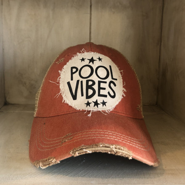Pool Vibes hat by BohoGroove featuring distressed off-white patch with Pool Vibes lettering and black stars on an orange vintage distressed snapback