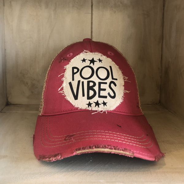 Pool Vibes hat by BohoGroove featuring distressed off-white patch with Pool Vibes lettering and black stars on a pink vintage distressed snapback