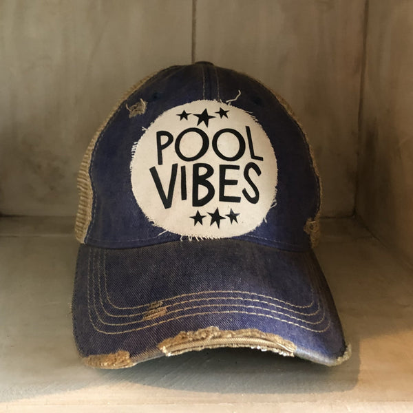 Pool Vibes hat by BohoGroove featuring distressed off-white patch with Pool Vibes lettering and black stars on a purple vintage distressed snapback